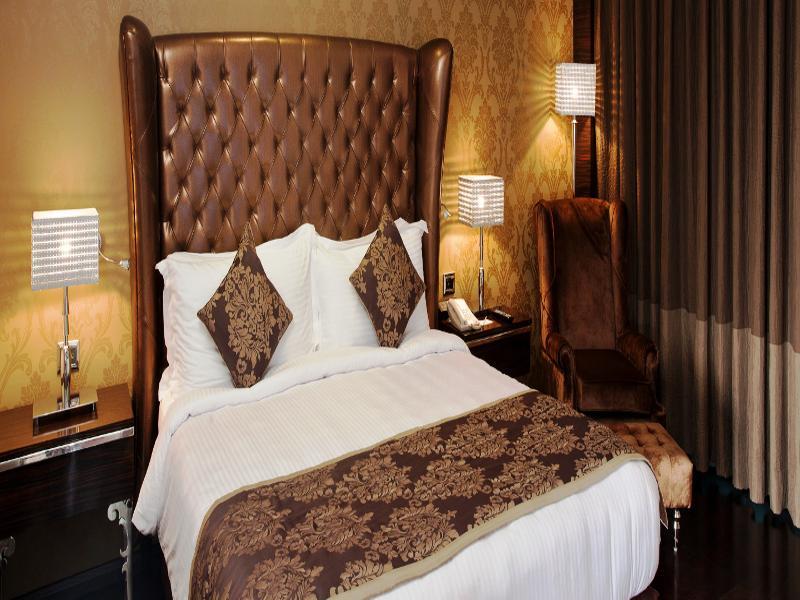 Radisson Blu Hotel New Delhi Paschim Vihar Экстерьер фото A bedroom at the hotel